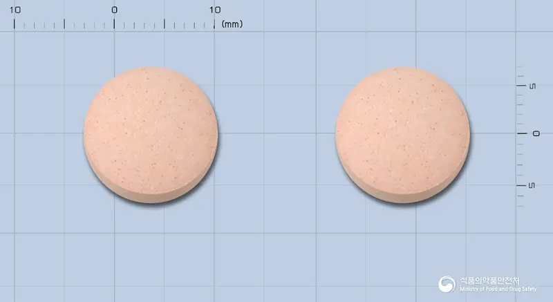 아클라현탁정250mg(아목시실린.클라불란산칼륨(4:1))(수출용) 앞뒤 사진 (분홍색 원형)