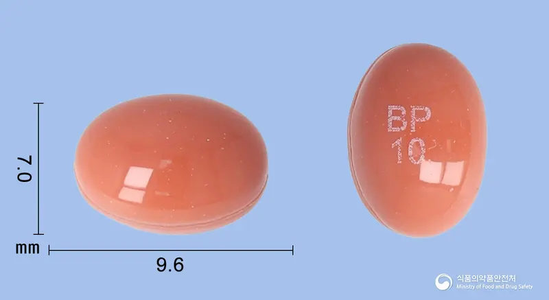 트레인연질캡슐(이소트레티노인) 앞뒤 사진 (주황색 캡슐, 각인 BP10)