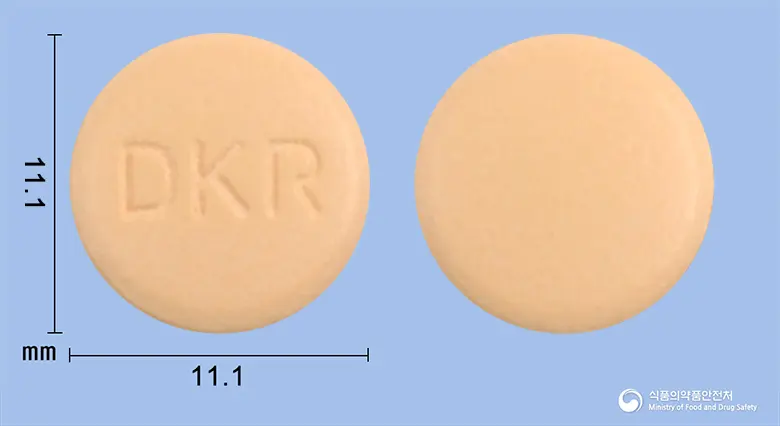 리메이트정(탈니플루메이트) 앞뒤 사진 (주황색 원형, 각인 DKR)