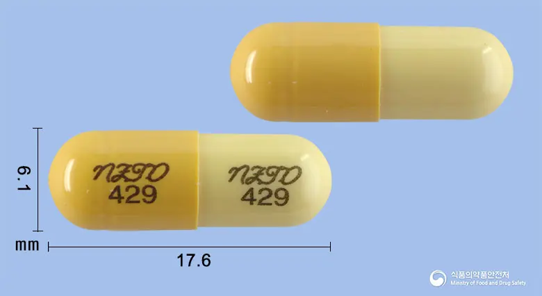액시딘캡슐(니자티딘) 앞뒤 사진 (노란색 캡슐, 각인 NZTD NZTD429 429)