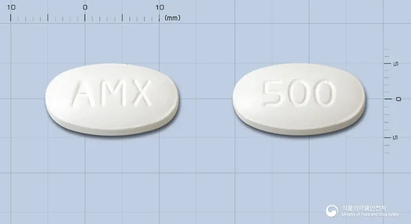 오그멕스듀오정500mg 앞뒤 사진 (흰색 타원형, 각인 AMX / 500)