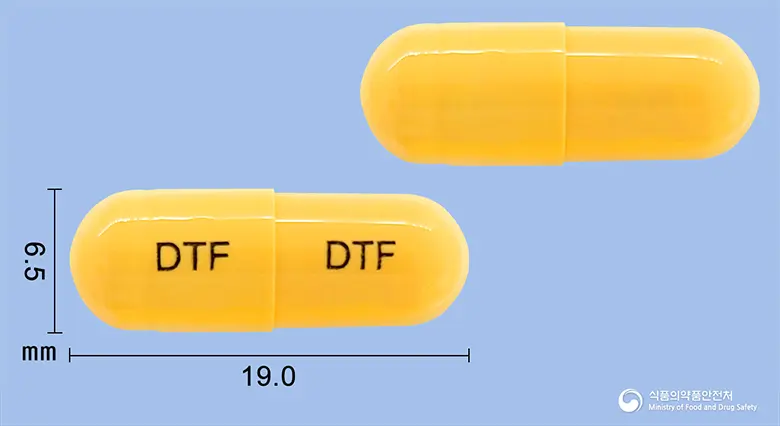 덴타씨포르테캡슐 앞뒤 사진 (노란색 캡슐, 각인 DTF DTF)
