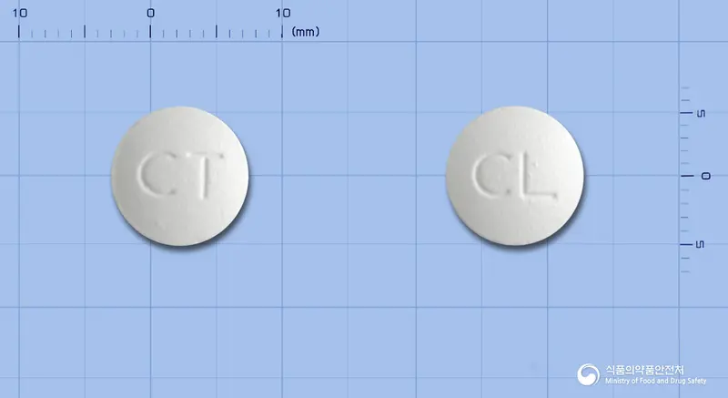 클로닉스정125밀리그램(클로닉신리시네이트) 앞뒤 사진 (흰색 원형, 각인 CT / CL)