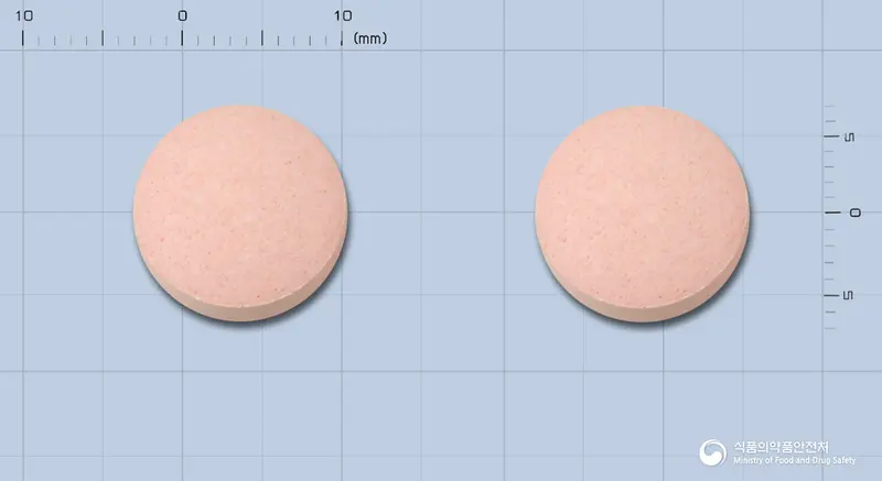 듀오넥스현탁정250mg[아목시실린·클라불란산칼륨(4:1)] 앞뒤 사진 (분홍색 원형)