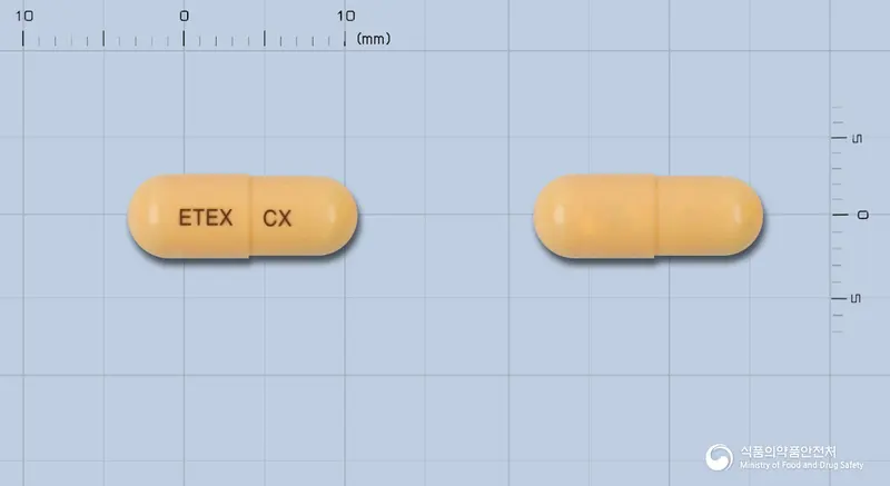 이텍스세픽심캡슐 앞뒤 사진 (주황색 캡슐, 각인 ETEX CX)