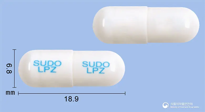 란프졸캡슐(란소프라졸과립) 앞뒤 사진 (흰색 캡슐, 각인 SUDO SUDOLPZ LPZ)