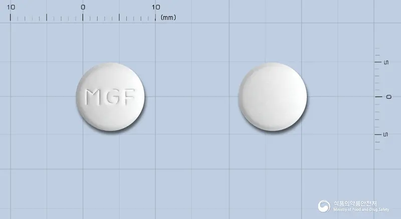 메가폴민정500밀리그램(메트포르민염산염) 앞뒤 사진 (흰색 원형, 각인 MGF)
