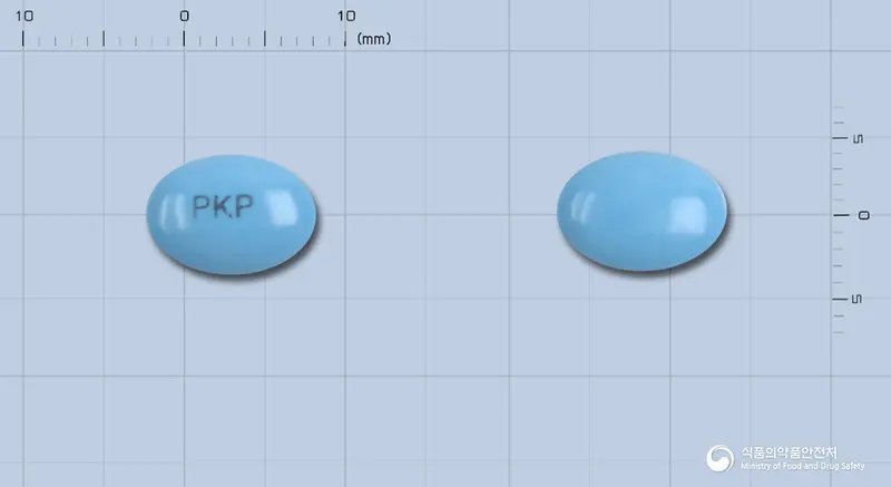 키리스정(수출용) 앞뒤 사진 (파란색 타원형, 각인 PKP)