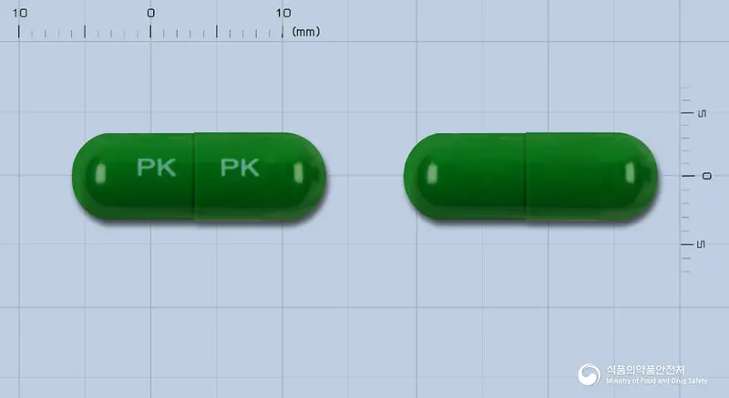 콜키프캡슐 앞뒤 사진 (초록색 캡슐, 각인 PK PK)