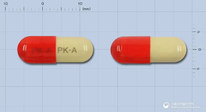 안티신캡슐(은교산건조엑스) 앞뒤 사진 (빨간색 캡슐, 각인 PK-A PK-A)