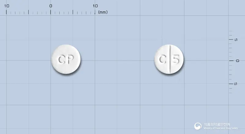 카르디날정25mg(카르베딜롤) 앞뒤 사진 (흰색 원형, 각인 CP / C 5)
