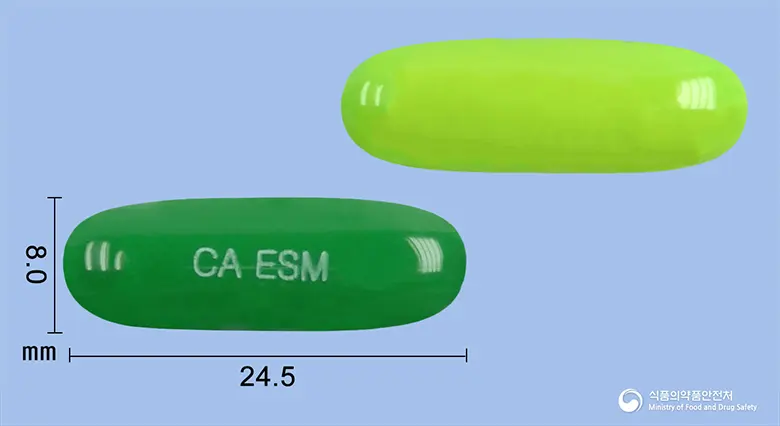 에스몰-에스연질캡슐(수출용) 앞뒤 사진 (초록색 캡슐, 각인 CA ESM)