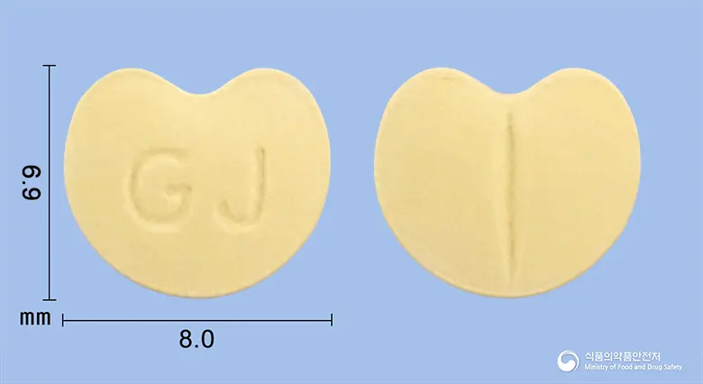 콩크린정(비소프롤롤푸마르산염) 앞뒤 사진 (노란색 기타, 각인 GJ)