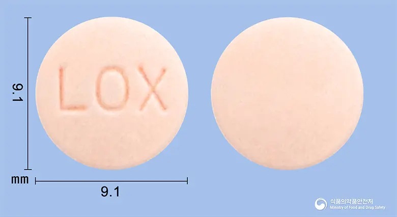 휴로펜정(록소프로펜나트륨수화물) 앞뒤 사진 (분홍색 원형, 각인 LOX)