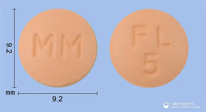 페노디핀지속정(펠로디핀)(수출용) 앞뒤 사진 (분홍색 원형, 각인 MM / FL 5)