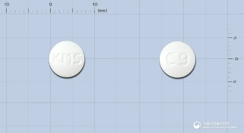 케이엠에스아테놀올정50mg 앞뒤 사진 (흰색 원형, 각인 KMS / C9)