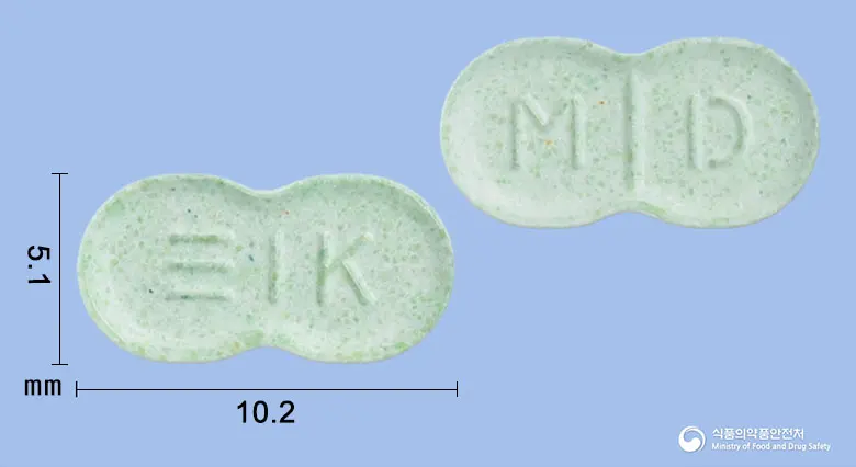 메디롤정2mg(글리메피리드)(수출명 : MEDIROL Tab. 2mg) 앞뒤 사진 (초록색 기타, 각인 M D)