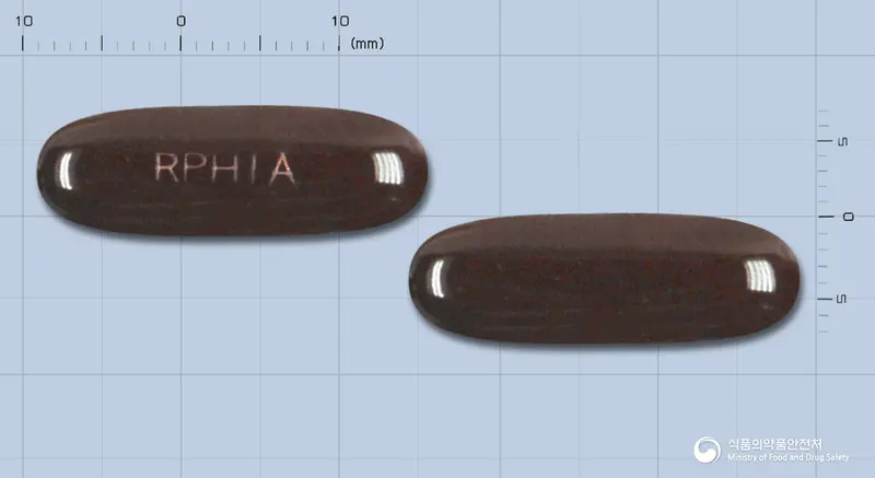 힐올연질캡슐 앞뒤 사진 (갈색 캡슐, 각인 RPHIA)