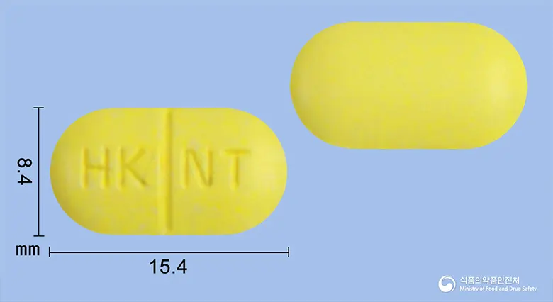 코러스나부메톤정(수출명:TamenbunTablet, KORUME TAB.) 앞뒤 사진 (노란색 장방형, 각인 HK NT)