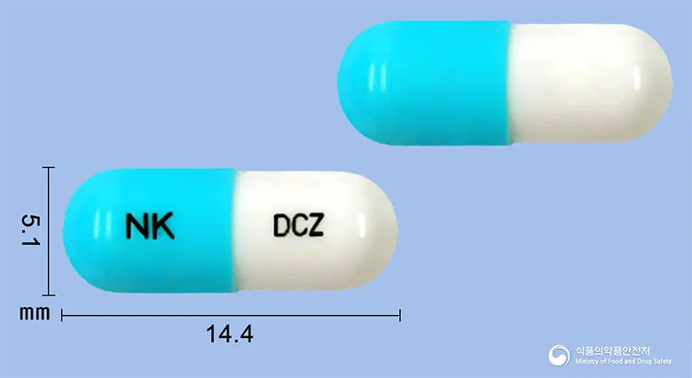 디카졸캡슐(플루코나졸) 앞뒤 사진 (파란색 캡슐, 각인 NK DCZ)