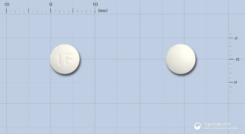 파모디틴정20mg(파모티딘) 앞뒤 사진 (흰색 원형, 각인 IF)