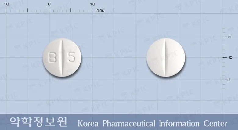 케랄정(덱스케토프로펜트로메타몰) 앞뒤 사진 (흰색 원형, 각인 B 5)