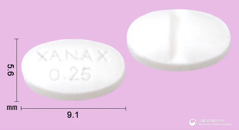 자낙스정0.25밀리그램(알프라졸람) 앞뒤 사진 (흰색 타원형, 각인 XANAX0.25)