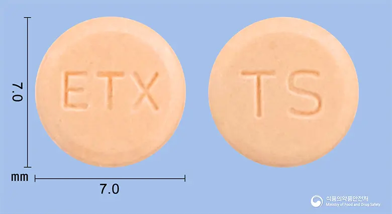 테레신정2밀리그람(테라조신염산염수화물) 앞뒤 사진 (주황색 원형, 각인 ETX / TS)