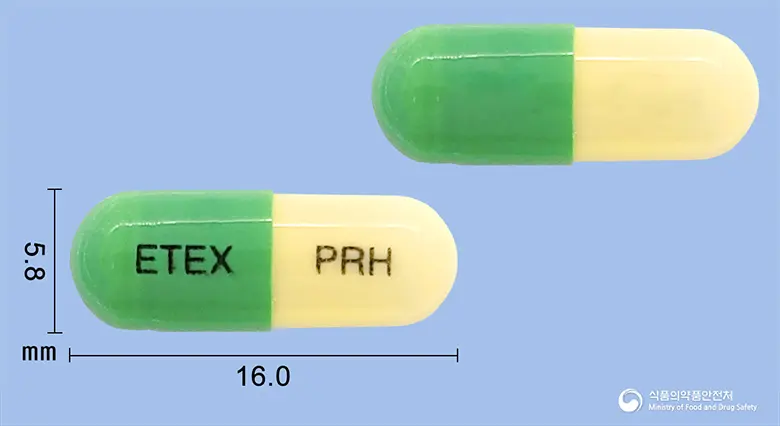 푸로틴캡슐(플루옥세틴염산염) 앞뒤 사진 (연두색 캡슐, 각인 ETEX PRH)