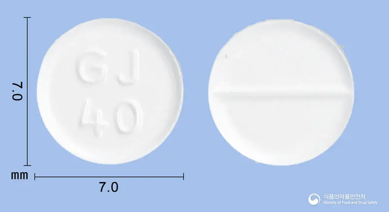 테라메드정(테라조신염산염수화물) 앞뒤 사진 (흰색 원형, 각인 GJ40)