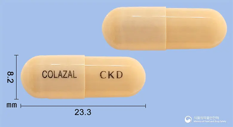 콜라잘캡슐(발살라지드이나트륨이수화물) 앞뒤 사진 (노란색 캡슐, 각인 COLAZAL CKD)