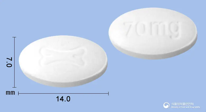 알렌드로정70밀리그램(알렌드론산나트륨수화물) 앞뒤 사진 (흰색 타원형, 각인 70mg)