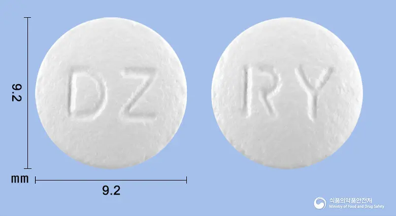 카비엑스엘서방정(독사조신메실산염) 앞뒤 사진 (흰색 원형, 각인 DZ / RY)