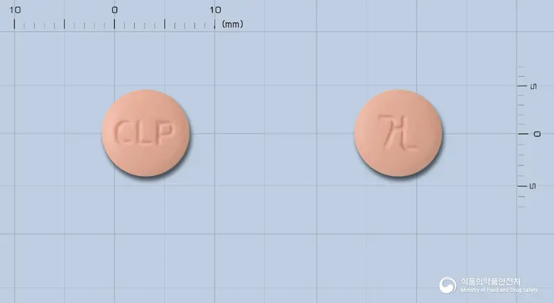 건일클로피도그렐정(클로피도그렐황산염) 앞뒤 사진 (분홍색 원형, 각인 CLP)