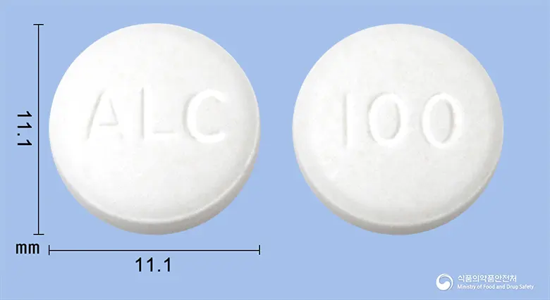 알트라졸정(이트라코나졸고체분산체) 앞뒤 사진 (흰색 원형, 각인 ALC / 100)