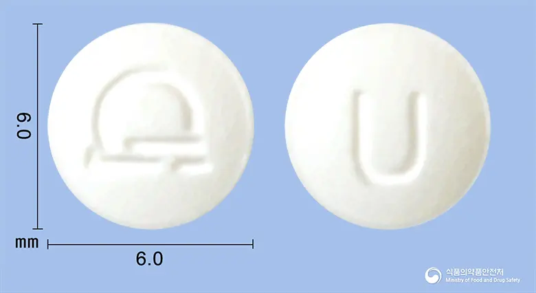 유로트롤정2mg(톨터로딘-L-타르타르산염) 앞뒤 사진 (흰색 원형, 각인 U)