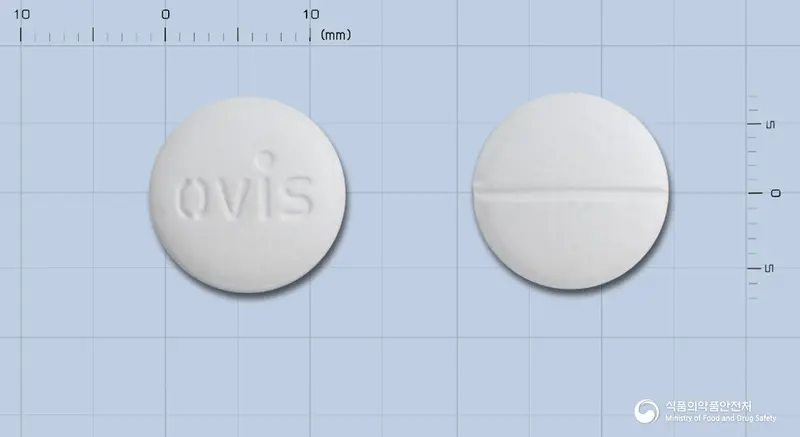 오비스정(알벤다졸)(수출용)(수출명:ZENTENE-F,ALBENDAZOLE) 앞뒤 사진 (흰색 원형, 각인 OViS)