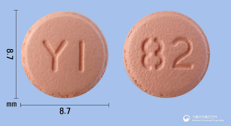 영일클로피도그렐정(클로피도그렐황산염) 앞뒤 사진 (분홍색 원형, 각인 YI / 82)