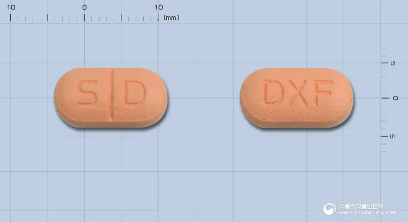 덱시부정400mg(덱시부프로펜디.씨) 앞뒤 사진 (분홍색 장방형, 각인 S D / DXF)