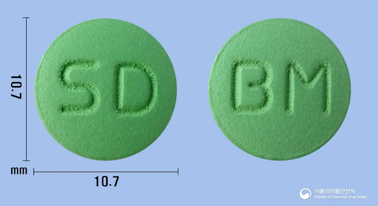 벨리만정(방풍통성산건조엑스) 앞뒤 사진 (연두색 원형, 각인 SD / BM)