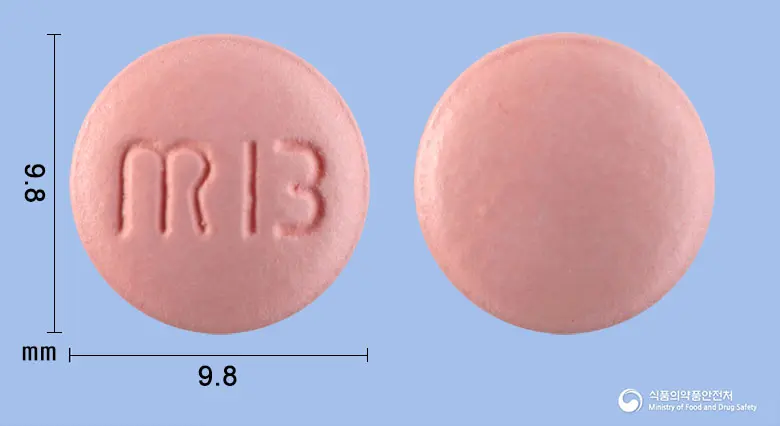 브로자임정(브로멜라인) 앞뒤 사진 (분홍색 원형, 각인 B)