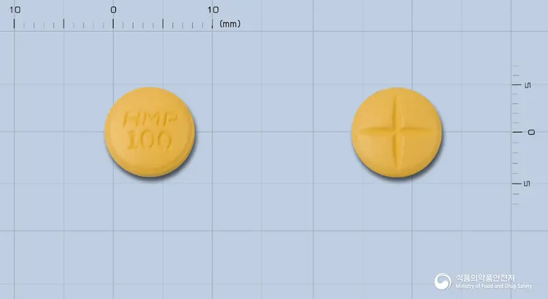 토피라정100밀리그램(토피라메이트) 앞뒤 사진 (노란색 원형, 각인 HMP100)
