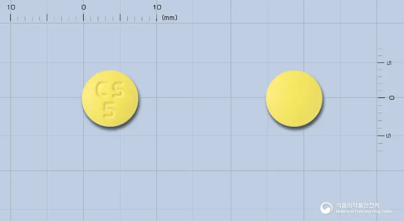 비소자이드정5/6.25mg 앞뒤 사진 (노란색 원형, 각인 CS5)