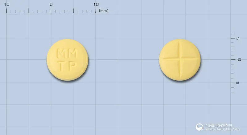 토파민정(토피라메이트) 앞뒤 사진 (노란색 원형, 각인 MMTP)