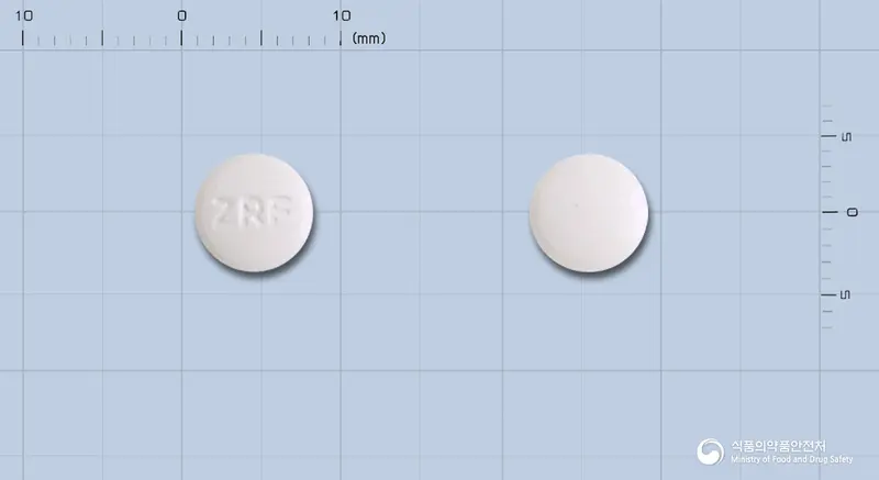 자이로펜정(잘토프로펜) 앞뒤 사진 (흰색 원형, 각인 ZRF)