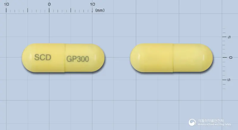 지펜틴캡슐(가바펜틴) 앞뒤 사진 (노란색 캡슐, 각인 SCD GP300)