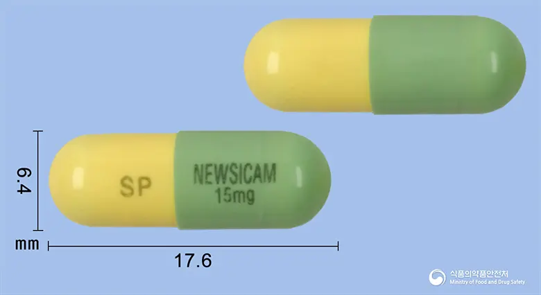 뉴시캄캡슐15밀리그램(멜록시캄) 앞뒤 사진 (초록색 캡슐, 각인 SP NEWSICAM 15mg)