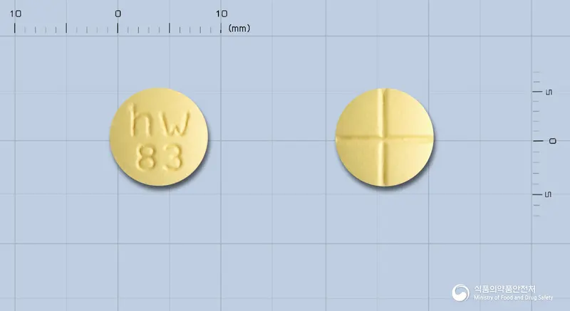 토람정(토피라메이트) 앞뒤 사진 (노란색 원형, 각인 hw83)