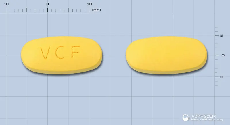 비타카오에프정 앞뒤 사진 (노란색 타원형, 각인 VCF)
