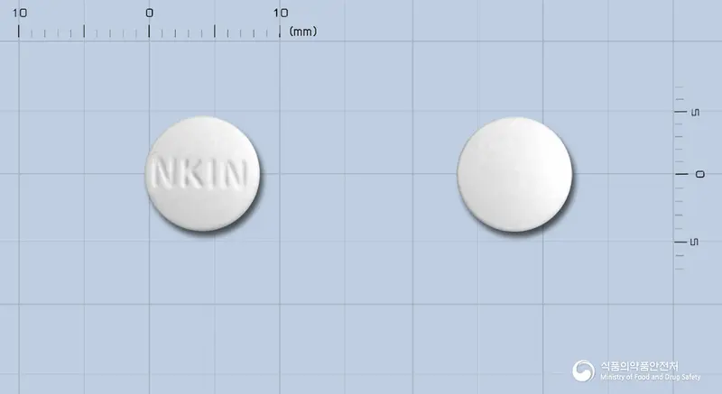 인플라정 앞뒤 사진 (흰색 원형, 각인 NKIN)